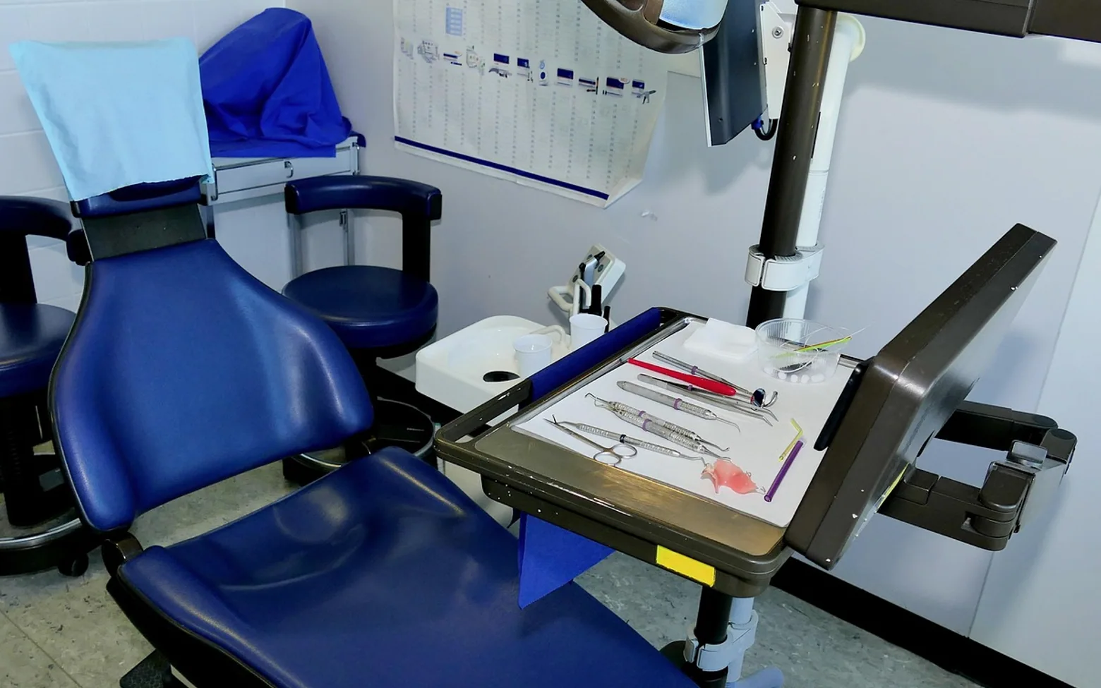 Dentist chair, dentist and dental office