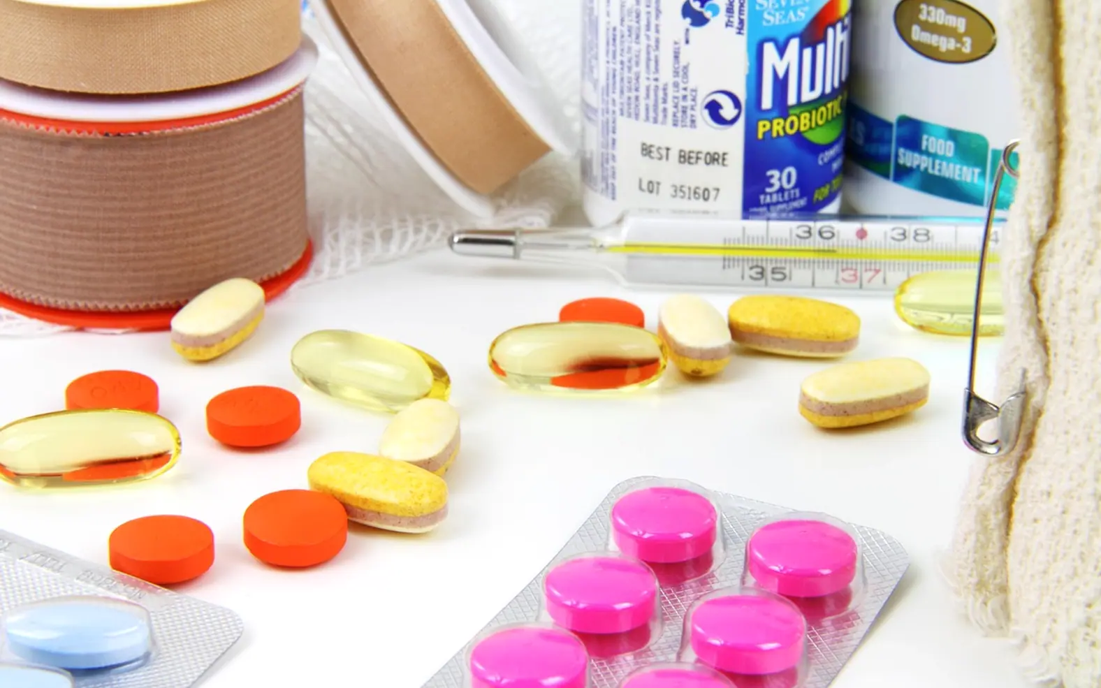 Aid, bandage and bottle